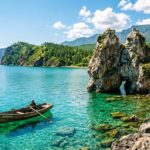 Wooden_boat_floating_on_Lake_202606262154